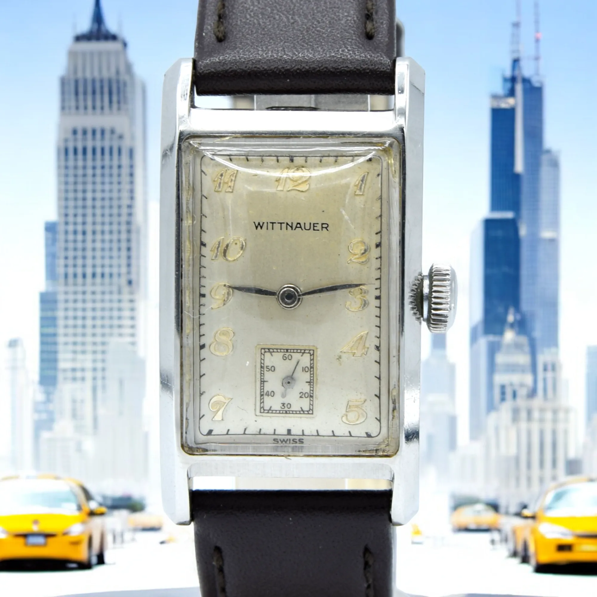 1940s Wittnauer Large steel Rectangular Early moisure resistant Wristwatch with Arabic dial